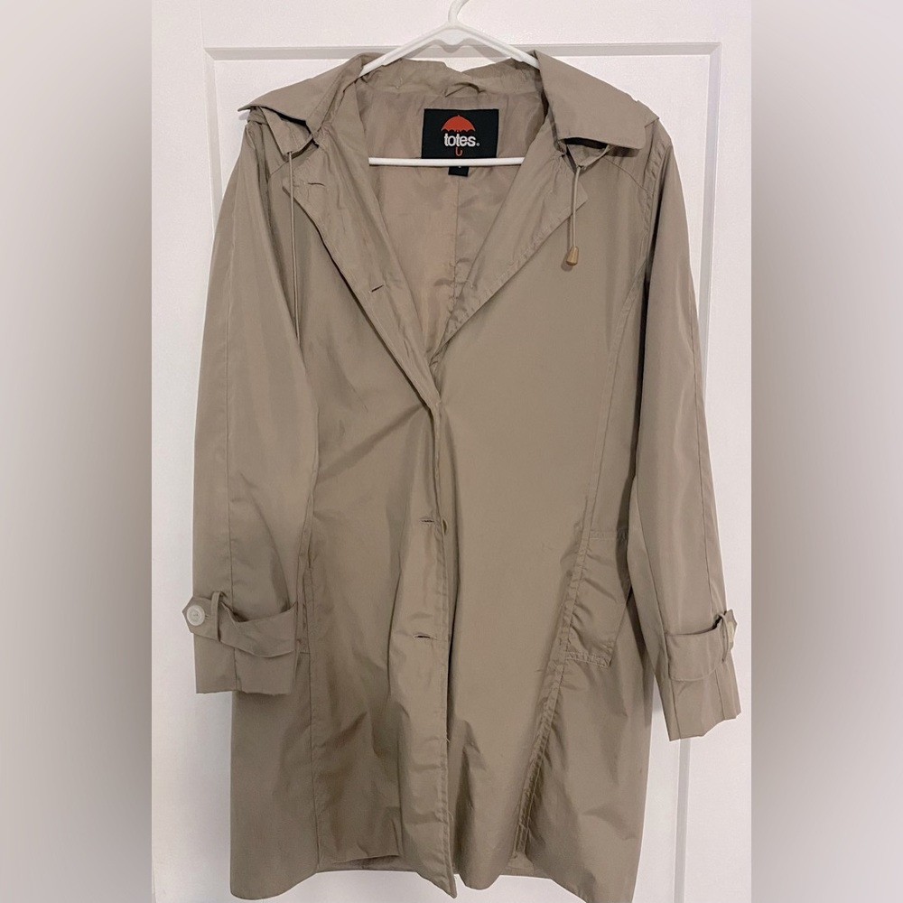 Hooded small trench coat. Taupe colored, two pocket light weight fabric.